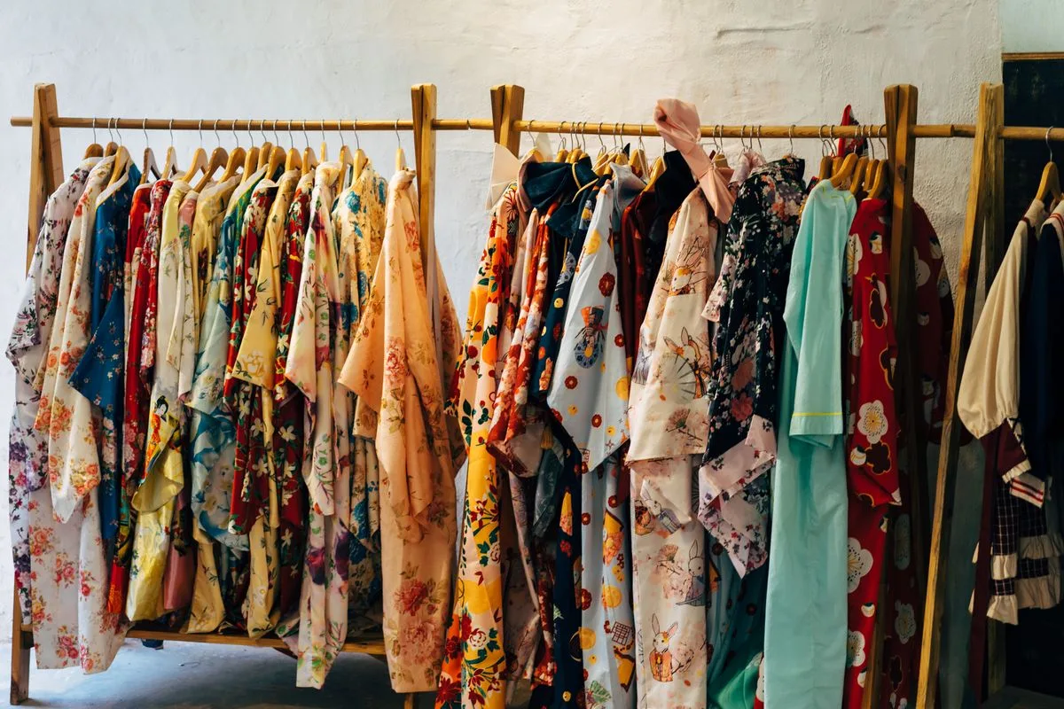 Colourful clothes on a boutique rack