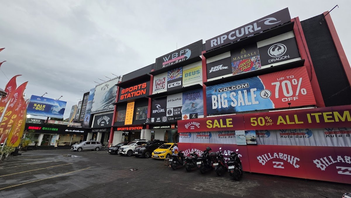 World Brand Factory Outlet storefront with surf brand sale signage, Kuta Bypass